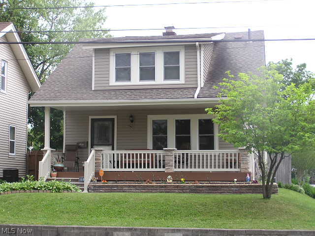One word says it all '...WOW!' Exceptionally well maintained, nicely landscaped yard, totally rebuilt 'maintenance free' front porch. Vinyl siding and windows. Gorgeous hard wood floor on first floor, spacious dining room with built in drawers, beautiful front door. large dining room with artificial fireplace with electric heater. All exterior walls have been insulated. Central air plus all rooms have ceiling fans. Fenced yard with deck...a must see! Remember that if you snooze, you lose!