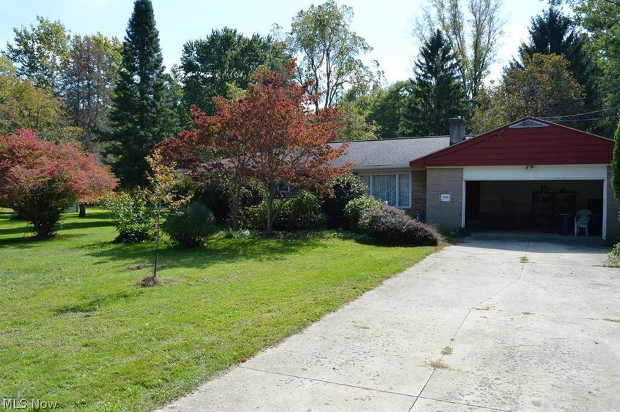 Large ranch on 1.75 acres. Home has flood damage from the storm on 5/12/14. House could be rehabbed if the buyer is willing, could be a really nice home or tear down and start over. Front wall foundation will need to be replaced and there is extensive damage inside. All carpeting has been removed, some hardwood floors may be salvaged, others will need to be replaced , along with drywall and HVAC. The home is located in a flood plain.