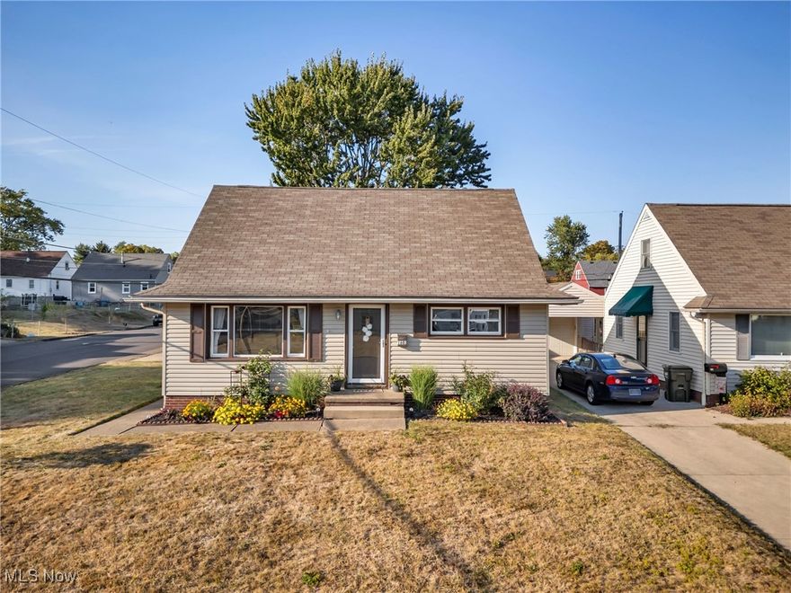 Pride of homeownership abounds in this bungalow! 3 bedroom, 2 bathroom, 2 car garage, and fenced back yard!  Well maintained corner lot in a great neighborhood.  Enter the sunny living room.  You will love the beautiful, original hardwood floors throughout most of the main level.  Kitchen with room enough to eat in, 2 bedrooms and a bathroom round out the main floor.  Go upstairs for the main bedroom with a large walk in closet.  Or go downstairs and relax in the cozy family room with a bar and a bathroom nearby. Great covered patio behind garage for outdoor relaxation! This house is move in ready and waiting for you!  Please schedule showings after 5 pm on weekdays or anytime on weekends!