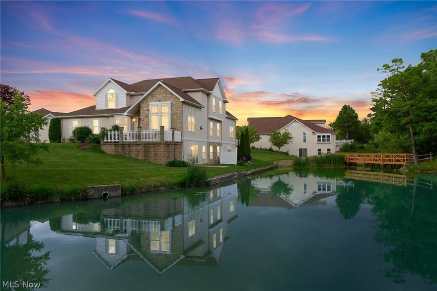 So much to offer! This stunning cluster home offers a fabulous view of the pond. Quality is everywhere you look in this open floor plan home, from the cherry cabinets with Corian countertops, to the cathedral ceilings in the dining and living rooms, to the wide woodwork and the rounded drywall corners. The walkout basement offers a large finish flex space could be for entertaining or separate living with a half bath and large storage space. You need to experience all the natural light in this home for yourself. Call your realtor today for a private showing!