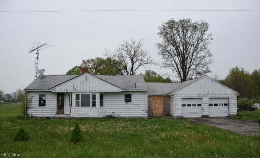 1.25 acre lot with lots of potential. You can upgrade, add to the current home or start from scratch and build the home you desire. The  home has three bedrooms and a full bathroom in approximately 1,050 sq ft. REO Property, Property Sold AS-IS W/O Repair, Warranty or Seller Disclosure.  The Listing Broker & Seller make no guarantees as to the accuracy of information herein; Buyer or Buyer’s Agent is responsible for utility activation related to inspections, Water activation not authorized; air pressure test only.