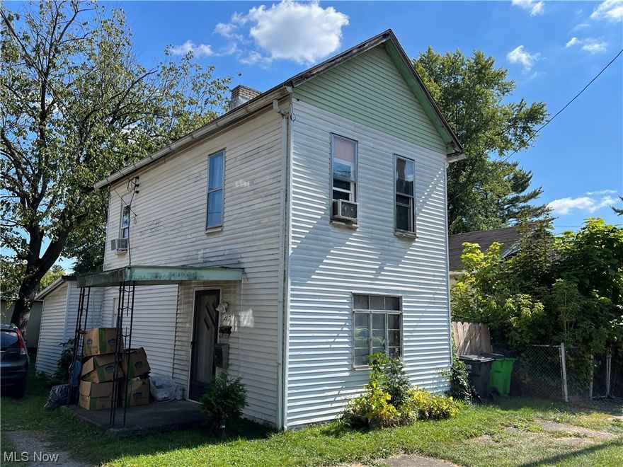 A few touch-ups and you have a great rental!  2 bedroom home.  Oak kitchen.  Most replacement windows.  Fence enclosed rear yard.  Great investment opportunity, don't miss it!  Previous tenants utilities averaged $70 for gas and $60 for electric monthly.  Property sells as-is.