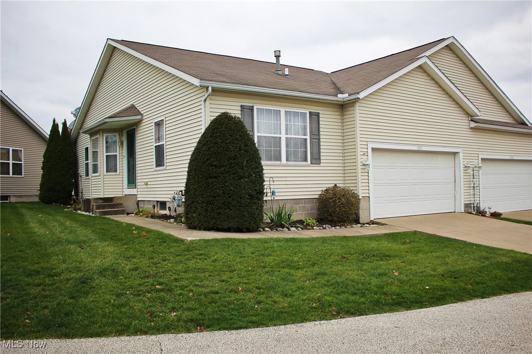 1201 Chaucer Circle, Lakemore, Ohio image 1