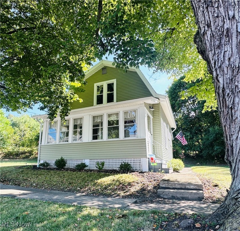 Remodeled and move-in ready! This charming home sits on the edge of Loudonville—offering the convenience of in-town living with a country feel. Enjoy mornings or evenings on the back covered deck overlooking the tree-lined backyard. Updates include newer carpet and flooring, an upgraded bath, electric improvements, c/a, furnace, kitchen appliances, vinyl replacement windows, vinyl siding, water heater and more. Also find an oversized 1-car garage, double lot, and enclosed front porch. The dry basement has been freshly painted. Perfect as your own home, a long-term rental, or an Airbnb investment opportunity!