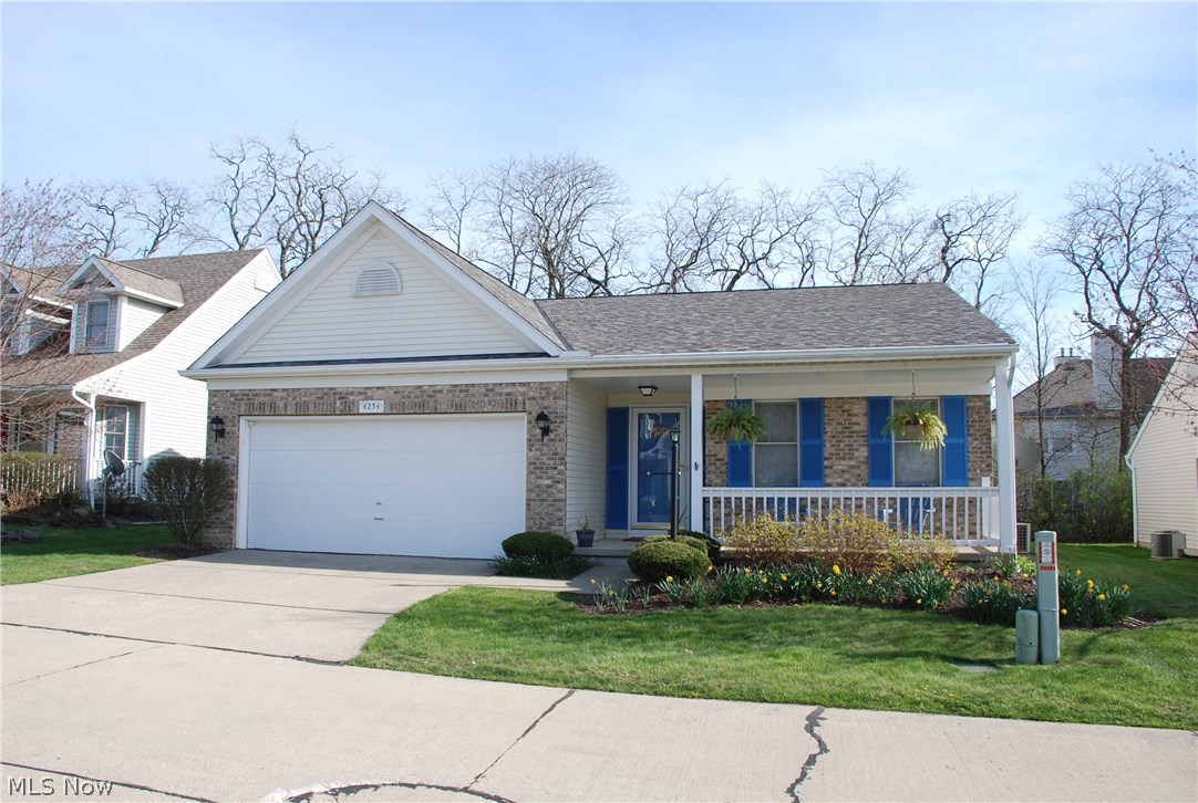 Rare find! Detached Ranch Cluster Home with an open and airy floor plan. Neutral décor, Large eat-in kitchen, Living room, Dining room, Three bedrooms and two full baths, Full basement nicely finished with plenty of storage space and workshop area. All appliances stay. First floor laundry, Attached two car garage.