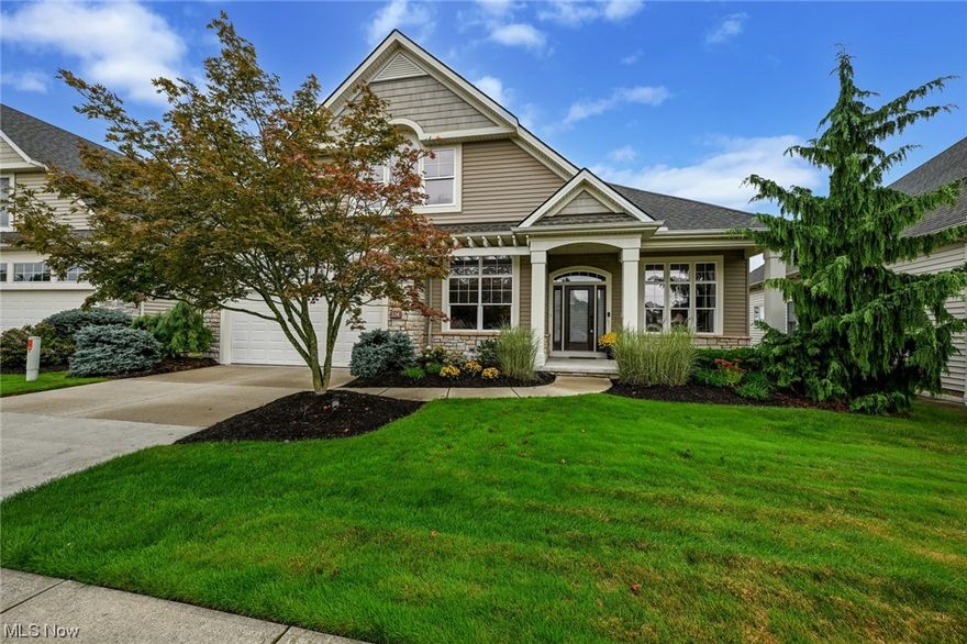 Welcome home to Wiltshire, Live, Play, Belong in this active community. This Newport Design offers an open floor plan with Owners Suite on the Main level with walk-in California closet design, his/her vanities and soaking tub. Also on the main level guest bedroom, full bath,  formal dining room and den and laundry. Large eat in kitchen with granite counters, custom maple cabinets, stainless appliances, breakfast bar, island, tile backsplash and butler pantry with wet bar. Great room with fireplace and volume ceiling. Second floor you will find a quiet guest bedroom with built-ins, walk-in closet, adjacent full bath and loft. Finished lower level with bar, fireplace, loads of storage, media area, recreation and half bath. Attached 2 car garage. Backyard with view of golf course, stone courtyard patio with brick wall. Development offers a swimming pool, public golf, and summertime concerts. Minutes to downtown Cleveland & Akron and airport, city recreation center, metro park hike & bike trails, nearby winery, fine dining and shopping. Roof and furnace original, air 2023, hot water heater 2021, newer refrigerator and range. Freshly painted interior, a pleasure to show.