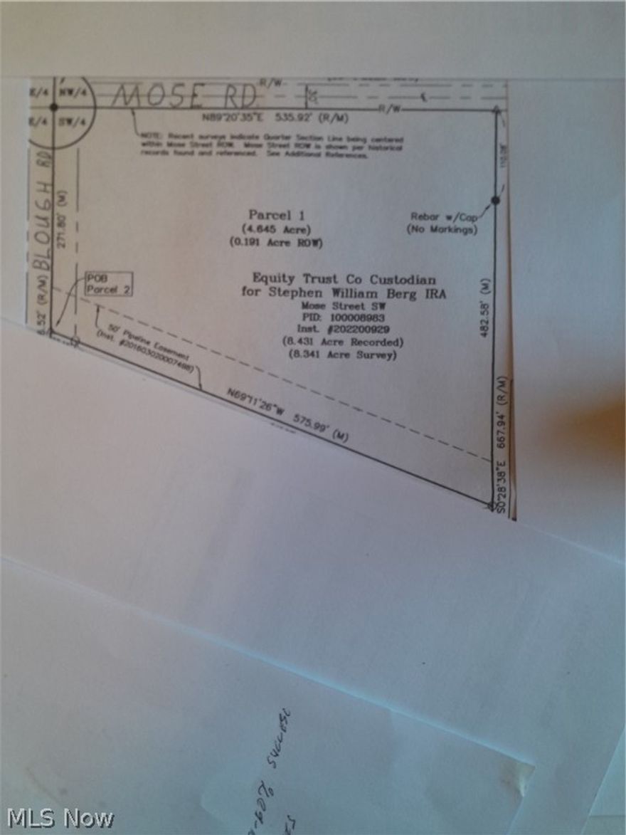 Excellent level building site. Beautiful rural area. 4 mi. from Navarre, 6 mi. from Strasburg, 8 mi. from Boliver. Agent owned. There is an easement for a gas line along the south edge of the property.
