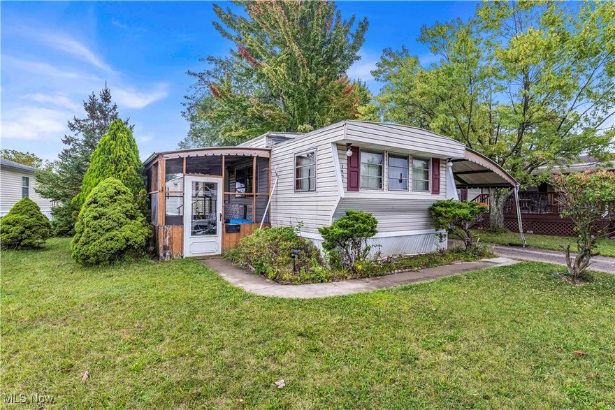 Welcome to this 3-bedroom, 1-bathroom, 1,000 sq. ft. manufactured home in Camelot Village! This home offers an affordable opportunity to own in a welcoming, family-friendly community with a spacious layout, bright rooms, and flexible living areas—perfect for first-time buyers, downsizers, or anyone looking to add their personal touch. Recent updates include vinyl siding, a new hot water tank, new furnace, new washer, new dryer, new refrigerator, and a new electric range, all included in the sale. While the home needs some TLC, it presents an incredible opportunity to customize and create your ideal space! Enjoy the convenience of a one-car covered carport and the ease of community living, with lot rent covering water, sewer, gas, trash, and snow removal for just $700 per month! Camelot Village is a peaceful, tree-lined community with 580 sites, on-site management, and social events including an annual picnic and golf outing! Located in the heart of Portage County, Streetsboro combines small-town charm with modern convenience. Commuters enjoy easy access to I-480, the Ohio Turnpike, and Route 14, while shopping, dining, and major retailers like Target, Home Depot, and Walmart are just minutes away. Outdoor enthusiasts will love nearby West Branch and Tinkers Creek State Parks, offering hiking, boating, fishing, and camping year-round. Families benefit from the well-regarded Streetsboro City Schools and the area’s friendly, neighborly atmosphere! Buyer must be approved by park management, with all occupants 18 and older completing a $35 background check. Per park rules, leasing is not allowed, ensuring an owner-occupied neighborhood with strong community pride! Don’t miss this opportunity—schedule a showing today to see it for yourself!