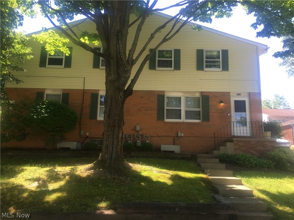 Nice three bedroom condominium on corner of complex. Tons of storage! Located between Kent field house and campus. Close to route 44. Few miles away from Kent downtown. Main living area has open floor plan with living room area and a huge coat closet, galley style kitchen over looking into eating area. Kitchen equipped with stove, refrigerator and two large pantries. The three bedrooms are located on second floor designed with neutral colors. Full bath and linen closet also on second floor. The basement is partially finished, and equipped with washer and dryer. Lots of storage room in the basement. The one garage door does have an opener, also some extra storage room in garage. Condo has one assigned parking space other than garage. All applicants to apply online with $50 application fee.