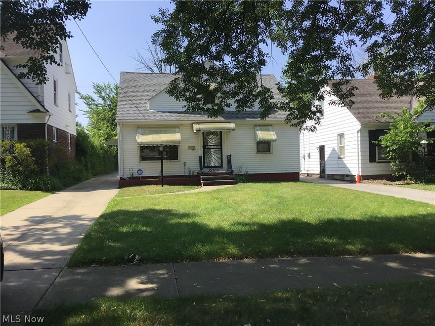 Cape Cod with 1 1/2 baths, finished basement, 3 Car Garage, Deck, Fully Appliance Kitchen. Tons of storage!