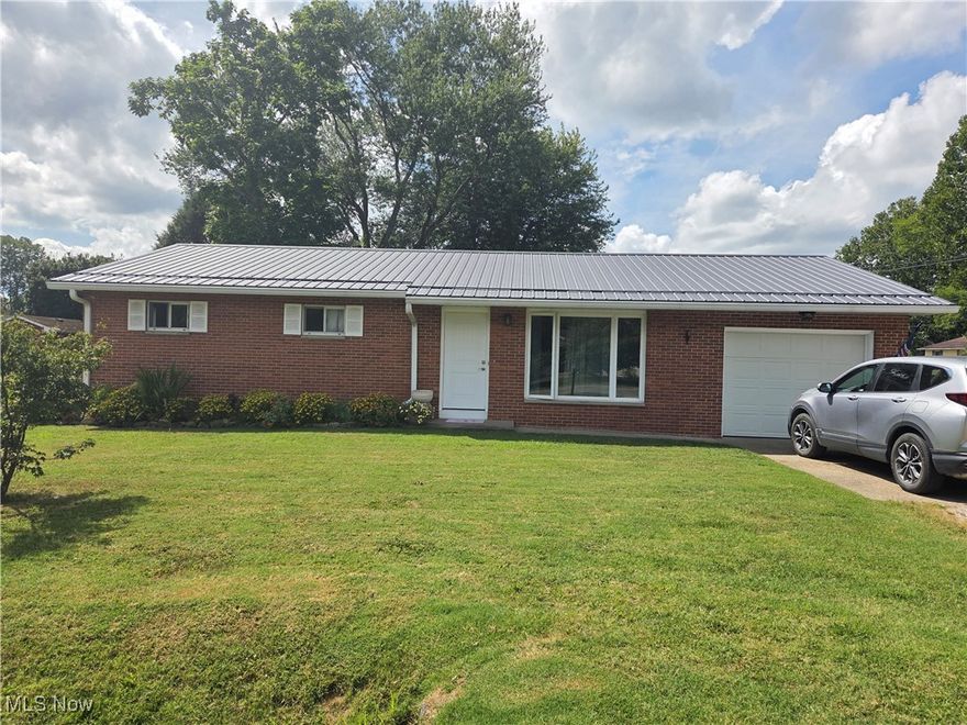 Beautifully updated home with extensive recent improvements inside and out. Major mechanicals have been replaced, including forced air HVAC and central air (2021), a Noritz on-demand hot water system (2021), and a full electrical service upgrade to a 100-amp Square D panel. The kitchen was completely remodeled in 2025 and features a new slide-in gas range and refrigerator. Additional updates include a new metal roof with double sheathing, soffits, fascia, and gutters (2022), a new front door (2023), a large picture window (2019), updated bathroom wall heater (2025), and new washer/dryer with exterior venting (2023). An ATLA water filtration system services the kitchen sink and refrigerator. The 1,500-gallon septic system was pumped and inspected in 2018 and pumped again in 2023. Oak floors are believed to be beneath the current LVT flooring in all rooms except the kitchen and bathrooms. This well-maintained home is move-in ready with thoughtful upgrades throughout.