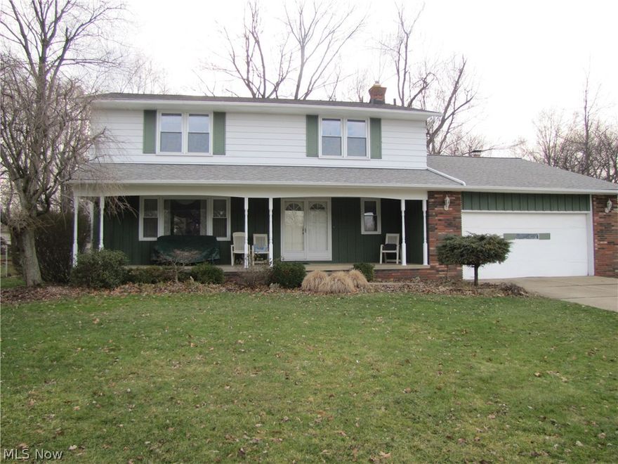 This spacious four bedroom 2 1/2 bath colonial is located on a quiet street but not far from I-271, shopping, and the Metro Park.  This home boasts many updates that include the HVAC (2012), H20 tank (2016), newer replacement windows and newer sliding door.  The updated eat-in kitchen has a large bay window that looks out onto the park like back yard.  The kitchen opens onto the family room that has a wood burning fireplace.  There is plenty of storage space in the house including the large closets in the four bedrooms.  The laundry area is conveniently located on the first floor.  The storage shed in the backyard allows two cars to park in the attached garage and out of the elements.  Relax and enjoy the covered porch rain or shine.