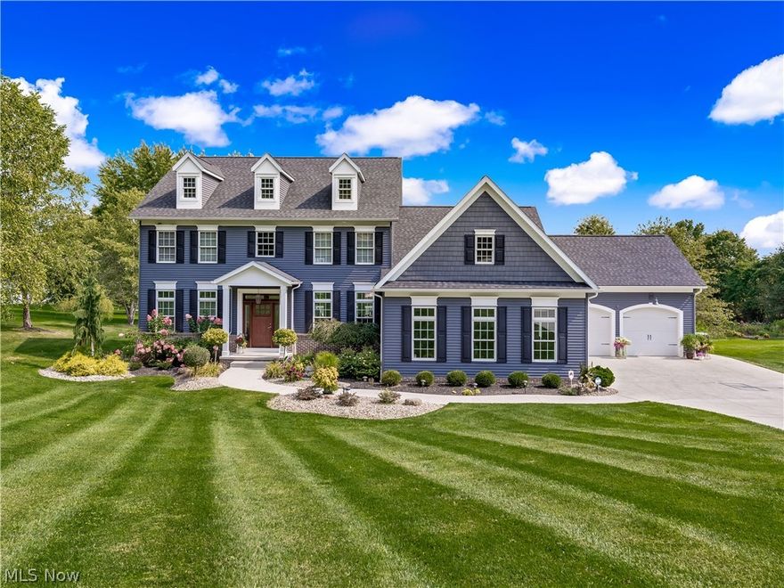 Breathtaking custom built colonial w/4 bedroom 4.5 bath on 2 acres!  Country living yet close to the highways, shopping and about 2 miles to Quail Hollow State Park. Built in 2013, this one has so much to offer. As you pull in the driveway you will notice the meticulous landscaping and the oversized 4 car attached garage is over 1200 square feet. Backyard is amazing. Backyard offers a large maintenance free deck that walks down to a massive stamped concrete patio. Patio is great for entertaining w/custom fireplace, built-in benches, waterfall and private country views. As you walk in the front door you will notice the open floor plan w/high 10 foot ceilings and oversized 8 foot doors on first floors. Massive 21 x 17 kitchen w/oversized island. First floor is a must see with a large 12 x 10 walk in closet w/built ins, 13 x 11 master bath w/double sinks and a custom tiled shower. Upstairs offers 3 good sized bedrooms, one w/its own bathroom and the other 2 with a jack/jill bath w/separat