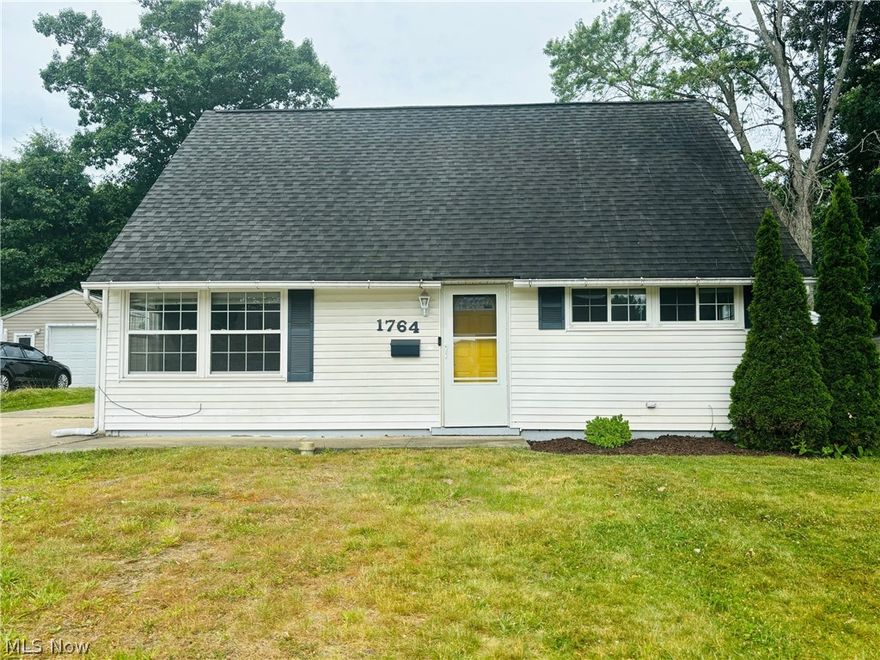 Don't miss this updated and maintained Cape Cod in Cuyahoga Falls. Bright and cheery, this 3 bedroom 1 bath home is move-in ready. The renovated kitchen includes updated cabinets, granite countertops, and updated appliances (2021). The kitchen opens to the living room which offers loads of natural light. A bonus room is located on the main level and can be used as an office, family room, or playroom. (It was originally a fourth bedroom but converted for an open concept!) The primary bedroom is located on the main level with a large closet and newer carpet (2022). The full bathroom has been remodeled with an updated vanity and toilet (2022). Luxury vinyl flooring was installed throughout the main level in 2020 and 2021. Two additional spacious bedrooms are located on the second floor with newer carpet (2022). A fantastic sunroom with luxury vinyl flooring (2023) overlooks the private, newly replaced, fenced yard (2023). There's a detached 1 car garage and a shed for extra storage space. Additional updates include new furnace and a/c (2020), water heater (2020), washer/dryer (2021), bathroom shower/tub surround (2015).