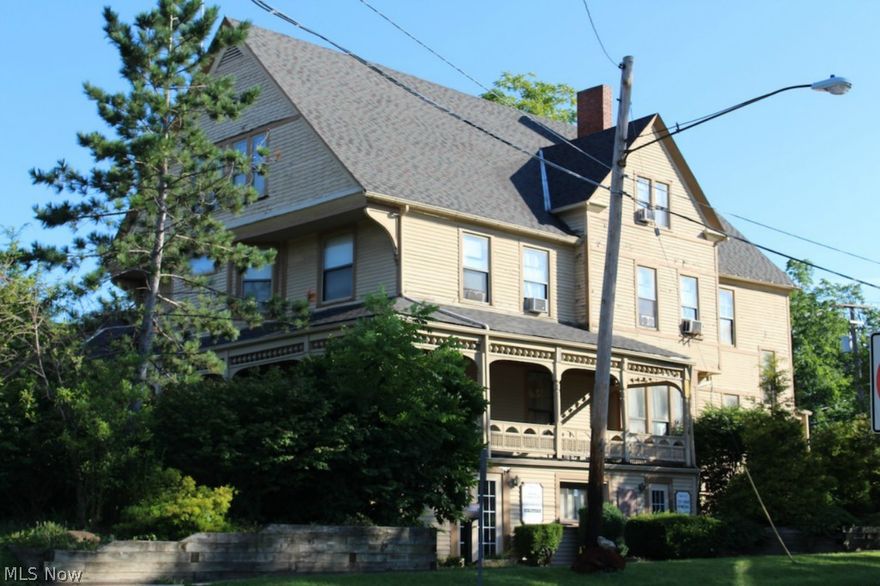 Spectacular Victorian in the heart of beautiful downtown Bedford. Impressive building with huge wrap-around front porch and onsite parking for all tenants. Walking distance to bus lines and retail. 6 apartments and 5 retail/office suites, 11 suites in total. 5 of 6 apartments are currently rented, some with very long term tenants. 2 of 5 business suites currently rented. Property has great income potential. Looking for the right investor as property needs work and has an extensive list of Point of Sale Violations. Buyer to assume all City of Bedford Point of Sale Violations. Qualified buyers only, proof of funds required for all showings - no exceptions.