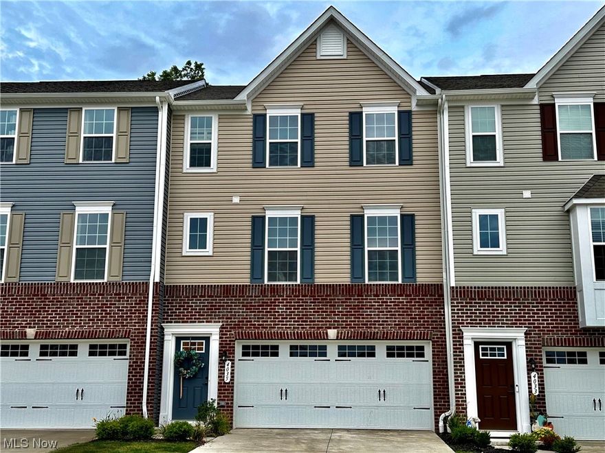 This high-end Townhome, wonderfully located, has it all! From Luxury Vinyl flooring throughout the home to the extra 4ft extension upgrade! The cul-de-sac location w/wooded view & large yard provide a serene setting. The exterior boasts a partial brick façade, & a spacious 2-car garage. On the main level, you'll find a great open floor plan with the living room seamlessly flowing into the "wow" factor kitchen and chef's dream and half-bath! From beautiful upgraded cabinets, elegant quartz countertops, herringbone backsplash, an expansive nearly 10-foot island w/newly installed sparkling pendants, to stainless steel appliances (Kitchen-Aid Fridge), a generous pantry & spacious dining area w/chandelier. You will be dazzled! Heading upstairs, you will find the Owner's Suite a true oasis w/a generously sized walk-in closet and designer bathroom and chandelier! Another full bath, a coveted upstairs laundry room and two additional bedrooms w/ new lighting fixtures complete the upper level! The Lower level is fully finished w/half bath and direct walk-out to a wooded view. Come see it in person and move in to experience the ease of beautiful living!