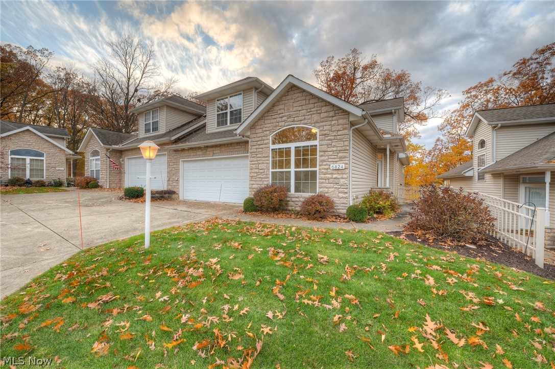 The Finest “Luxury” Maintenance Free Living in Parma awaits. This “Unique” 3 Bedroom 3 Full Bath Condo is tucked away nicely in the esteemed Regency Highlands development. Upon arrival you will immediately notice the curb appeal. Clean Lines, Stone Front, 2 Car Garage, & a private side entrance will catch your eye. Walk in to an open flowing floor plan. A Great Room with soaring vaulted ceilings with slider access to a large deck with spectacular panoramic wooden views is just the start. Add a large Eat in Kitchen complete with all appliances, pantry, bar top, and plenty of sunlight. There is a 1st floor front Bedroom that also makes a nice Home Office. There is a Full Bath adjacent to the Front Bedroom which is great for guests. Like Convenience? The 1st Floor Master Bedroom comes complete with attached Master Bath, Ample Closets & wooded serene views. Don’t forget about the 1st Floor Laundry Facilities. Want “Unique”? A Must See 2nd Floor is a Huge Loft/ 2nd Master Bedroom com