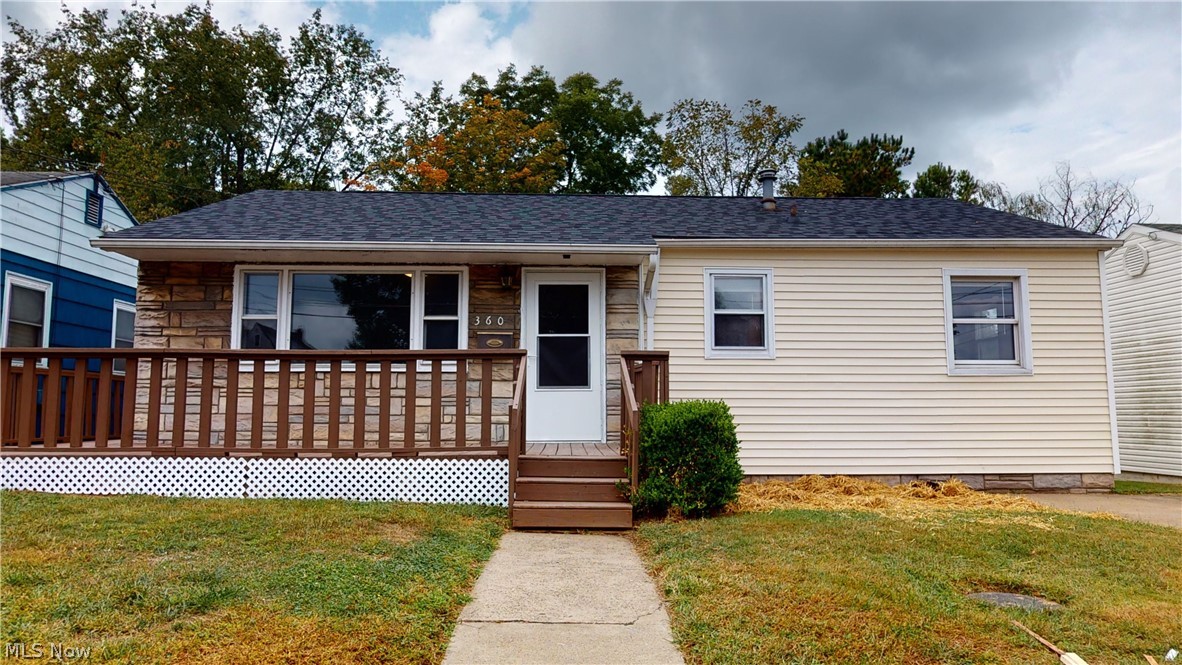 You will love the convivence of location! Awesome deck on front that wraps around to the backyard that is fenced in. New kitchen new cabinets, counter-tops, sink, flooring. new windows, carpet-so much more.