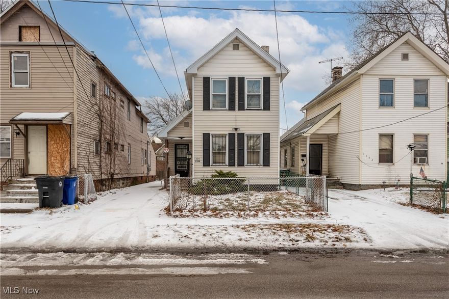 Incredible investment opportunity in a vibrant neighborhood! Explore this delightful three-bedroom, one-bathroom colonial home, ideally situated just minutes from downtown and close to an array of restaurants, shops, and Asiatown. The property features beautiful natural wood flooring and wood-framed vinyl windows. Its exterior is low-maintenance, thanks to durable vinyl siding. Residents can unwind on the roomy covered back deck and enjoy the convenience of a two-car garage.