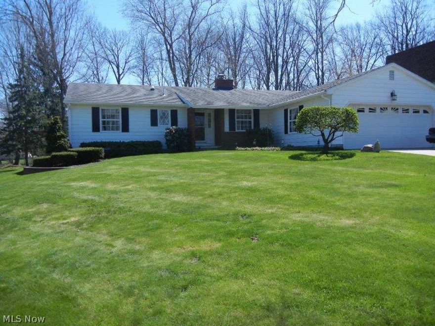 Super clean ranch home in Windel Hills.  (Canfield Schools, Boardman Twp)  Living room/dining room combo with large picture window overlooks private backyard, oversized eat in kitchen, 1st floor laundry, awesome cathedral Florida room with brick patio.  Hometrust warranty included