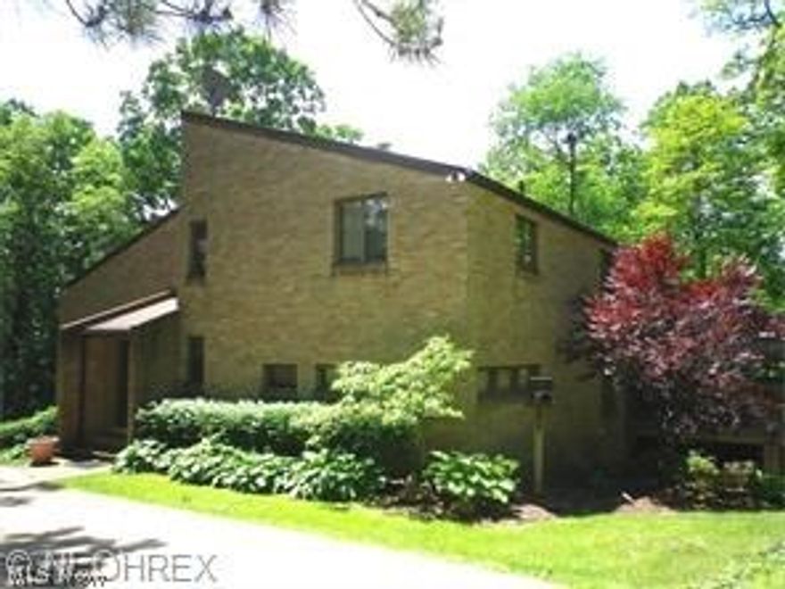 Rental Rental Rental...Wonderfully wooded, private setting with feel like a home all brick structure a unique hidden three bedrooms, two full bathrooms a large great room with fire place and dining that leads you to the three seasons room for relaxation. Eat in furnished Kitchen. Laundry room in lower level and a two car garage. In the warm summer months a the salt water pool will be refreshing. No Smoking, pets will be considered a non refundable deposit of 1300.00 if the pet is approved. A security deposit and first months rent required along with a paid by tenant(s) back ground/credit check. Immediate possession 1300.00 a month which includes Trash, Gas/Heat, Water & Sewer.  Ask your real estate agent to share the brokers remarks.