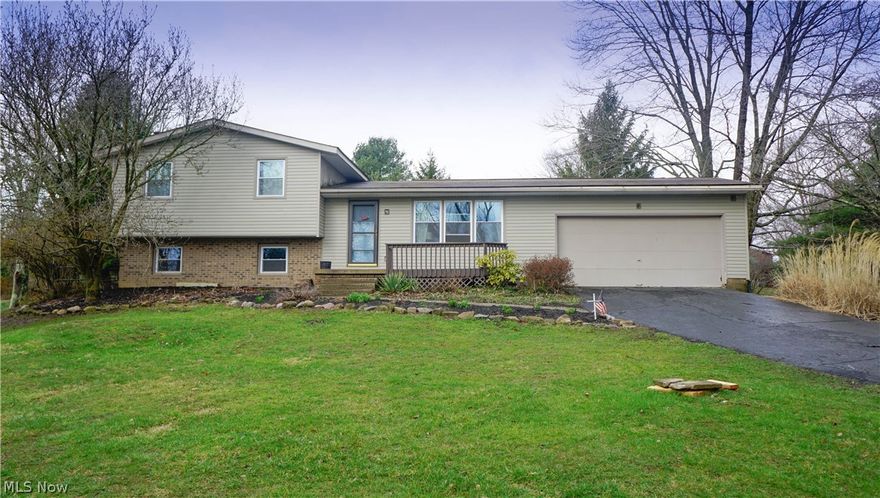 Updated 4 br/3 bath multilevel home with 3 season room, wood burning FP, Brand new siding and roof, newer windows, AC and Furnace, fully applianced kitchen. Large rooms for entertaining, with a3 ample bedrooms on upper level with 2 full baths, and a 4th BR room and full bath on lower level. This neighborhood is very quiet with very little traffic. Large lot with mature trees, and a deck on the back large enough for a hot tub!