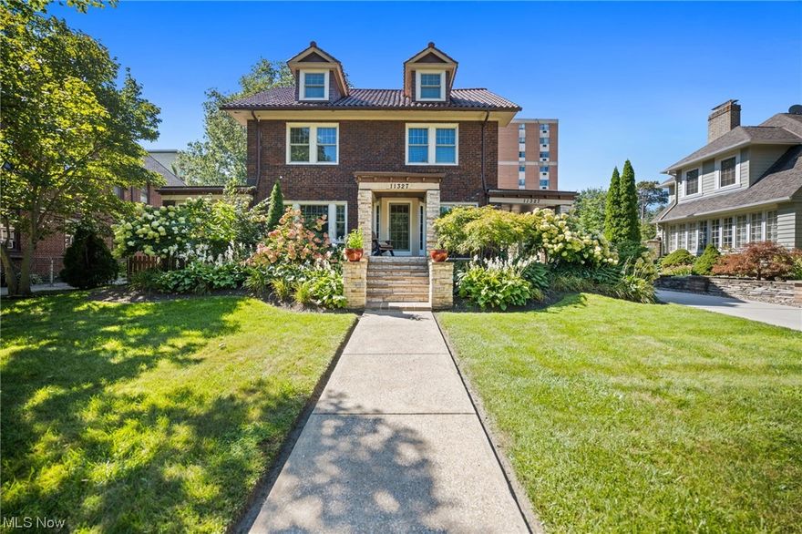 GORGEOUS brick colonial home built in 1920 bursting with modern updates throughout while still able to maintain the older integrity of the home.  Located on a beautiful tree lined street minutes from Edgewater park on the Gold Coast. This home boasts oak hardwood floors throughout.  Kitchen has been remodeled (2018) with high-end Kitchen Aid stainless steel appliances including an exquisite Thermodor stove.  Home features 5 spacious bedrooms including a third floor attic suite that has its own kitchen and full bathroom.  One of the bedrooms has been transformed into a custom closet designed by California Closets. Updates completed in the home include Anderson windows and doors with white oak trim (2021), full house central air with Unico High Velocity units (2022), and 2-1/2 car garage built in (2013). The outdoor kitchen and jacuzzi were added in 2020 and will completely enhance your outside living experience. Schedule your private showing and check out this beauty!