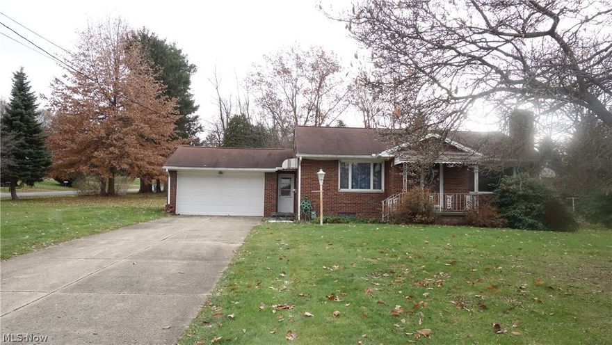 Brick ranch on a fabulous nearly 1/2 acre lot. Located in the lovely Portage Lakes area (Coventry Twp) within minutes to the Portage Lakes State Park w/public boat launches (see photos). Lots of flat yard with room to possibly park your RV, boat and more! Rich and very beautiful hardwood floors in this roomy, open ranch... Truly a home worthy of your personal care and time w/a sweet 1st floor 3 season room that looks out to a big back yard! Partially finished basement previously had a 2nd kitchen, superb possibilities here!!