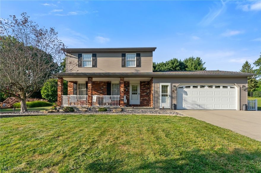 Come see this 3 bedroom 1 1/2 bath home in Hubbard school district. This home is for those who want to outdoor entertain.  The inground swimming pool is 20"x40" with walk-in steps, new gas heater and solar cover. Surrounding the pool is combination of nature stone and stamped concrete. There is a fire ring as well as a newly blacktopped basketball hoop area.  The outdoor entertainment area also has a covered patio with a ceiling fan and recessed lighting. The sliding glass doors enter the home's second family room with a vaulted ceiling, skylights, and gas fireplace. This then leads into the dinning area and kitchen with custom-built cabinets, stainless steel appliances. The first floor also features a half bath and a large family room. The finished basement adds even more living space to this home. The attached oversized garage has hot/cold water with a drain. This home has a beautiful brick front with vinyl siding, a covered front porch, a double wide cement driveway. The 24"x28" brick and vinyl backyard outbuilding with a walk-up loft, and dual garage doors.