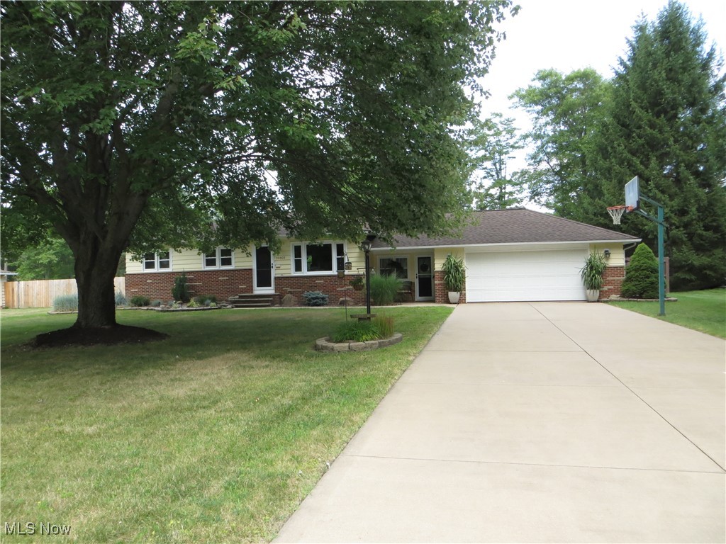 Is this the home you’ve been waiting for? 10821 Gregory Lane is an exceptionally maintained, modestly sized, ranch home resting on a little over a half-acre in the charming community of North Royalton. This move-in ready home welcomes its new owner to compose another chapter of memorable moments. How will your story unfold? Gregory Lane is a quiet, low-traffic neighborhood conveniently located to a variety of amenities including retail, restaurants, Cleveland Metroparks and the much sought-after North Royalton school system. Welcome home as you enter the 18-foot double driveway. Protect your car from the elements in the 2.5 car garage. Take in the beauty of the landscaping accenting the home’s exterior and surrounding the rear yard stamped concrete patio. Fabulous atmosphere to host your summer Bar-B-Que. Shoot some hoops – Goliath Basketball Hoop! Enjoy the tranquility of the privately fenced rear yard. There is a storage shed. A breezeway with tile flooring joins the garage to the home. All door hardware updated to oil rubbed bronze. Inside you will find a neutral color pallet. Windows are adorned with high quality blinds in every room. Ceiling fans cool most rooms. Armstrong vinyl and laminate flooring flow nicely throughout the home. The kitchen offers plenty of cabinet and counter-space with appliances remaining. Nicely sized dinette to enjoy your culinary delights. Living area with plenty of natural light. Three bedrooms and a full bath complete the first floor. The lower level features a recreation area with nature-stone flooring, stucco textured walls, and glass block windows. Electric service updated in 2025. Exterior painted approximately three years ago. Stamped concrete recently sealed. This home displays pride in ownership!