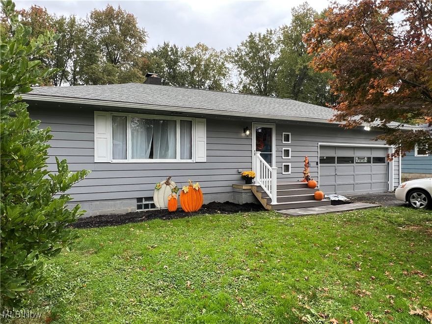 What a lovely place to call HOME! This fantastic Ranch is situated on a perfect lot in Howland! The Extra-Large Living Room greets you as you enter through the front door with a beautiful corner Fireplace. The Dining Room also has plenty of room and lots of natural light. The Kitchen includes all Oak Cabinets, Ceramic Tile Back-Splash, All Black Appliances, and extra long counter space. 3 nice size bedrooms 2 Bedrooms have Hard-Wood Flooring with a possibility of hardwood being under the 3rd bedroom carpet. Full updated Bathroom Complete the 1st floor.  Enjoy another fireplace in the Full Basement with new Sump Pump, Laundry area and lots of storage space. Huge Fenced-In Back yard is perfect for entertaining or just privacy. Don't miss out! Call Today!
