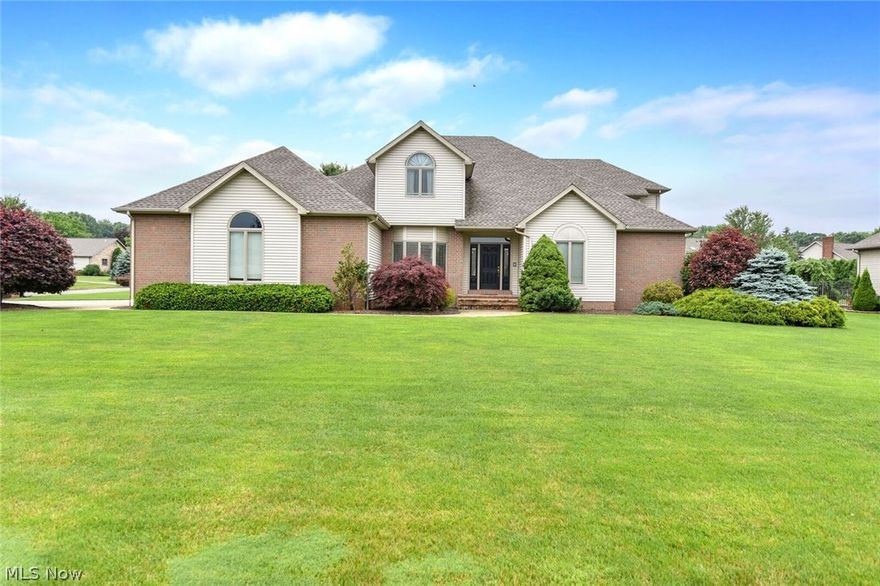 Meticulously cared for spacious 5 bedroom, 6 bath home with many upgrades. Beautiful cherry hardwood floors in 2 story foyer, great room, 1st floor office and 1st floor master bedroom. Large eat-in kitchen leads to 2 tiered paver patio and private back yard. 4 Bedrooms up, one with full bath. Large workshop, newer roof, hot water heater and sump pump. Whole house water treatment system, reverse osomosis drinking water.