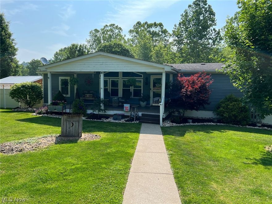 One story 3 bedroom with 2 full baths manufactured home sitting on a beautiful 1.56 acre lot. Entire home has been updated & is move in ready. Main floor is just shy of 1,600 Sq. Ft. of living space. Master bedroom with en suite. Master bath has ceramic tile in shower & floors. Large living & family room.  Laminate flooring through main living area.  Finished  rec room adds additional living space. Main floor laundry room. Plenty of storage space throughout the home. Outdoor space features a 12x30 composite deck (partially covered), steps down to an additional pool deck. Shelter house for additional outdoor entertaining fenced in back yard, partial privacy fence. Front covered porch (also composite). 2 car detached garage along with a 24x24 barn with electric in side yard. Home is located in Springfield Twp. Jefferson County. Edison local school district less than 2 min. drive to John Gregg Elem.

*Above ground pool 27' round
*Whole house Culligan System
*Bonus spaces downstairs, could extend rec room
*Ventless propane fireplace in family room & the rec room