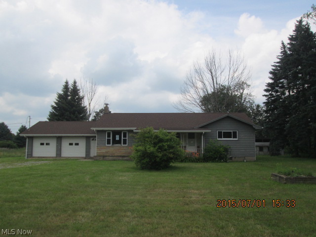 Springfield Schools 3 bedroom ranch situated on 9.75 acres with a lake.