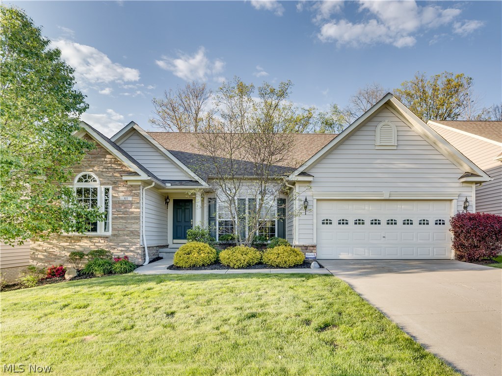 This impressive Ranch style home is situated in the desirable Hidden lakes community of Peninsula with Hudson schools and Falls utilities! The floor plan plus décor is open, light and bright with cathedral ceilings and multiple windows across the back on both levels welcoming the sunlight! Beautiful hardwood floors from foyer to kitchen to dining room. Very spacious Great Room with full wall stone fireplace. Beautiful cherry kitchen cabinets plus stainless appliances. Fabulous dining area with cathedral ceiling steps out to deck porch. The Master suite includes a lighted tray ceiling and private bathroom with dual sinks and dual closets. First floor also includes two more bedrooms, guest bathroom, laundry and French doors into the office. You'll love the finished lower level, it's very spacious, light and open. It includes the huge rec room, full bath, storage area and a walkout to the brick patio overlooking a private wooded area. Don't hesitate, call today!