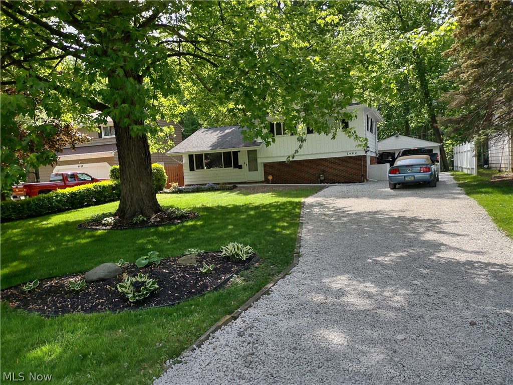 Nice 3 bedroom split level on a quiet mature street in Mentor. Laminate wood flooring throughout the living space and new carpet in all three bedrooms, updated bath. Move-in condition and well maintained. New cement patio , porch, and walkways. Private yard, close to lake, parks, Mentor Schools , stores and more. Schedule your appointment today.