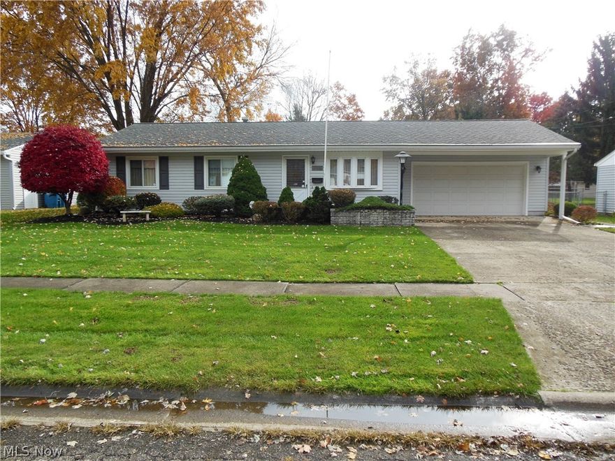 This charming ranch on a slab is located on the south side of Rte 254.  It is in the Amherst School District and within a couple miles of Route 2, shopping centers and restaurants.  This home features a spacious living room with a beautiful bay window facing north.  There are 2 bedrooms with louvred folding doors and windows in each.  Between the 2 bedrooms is a full size bathroom.  The master bedroom has a large closet with sliding doors, a master bath with a new glass shower stall and other updates.  The great room provides a gas fireplace, vaulted and beamed ceiling, and a sliding pair of doors to a covered porch.  The backyard has 2 storage sheds, is fenced in and has access to the garage.  The double car garage is heated, and there are sliding doors to a storage area and a large work bench.  The landscaping accents the front of the house with a planter and beautiful plantings.  Come and tour this cozy ranch home.  You will certainly fall in love with it!