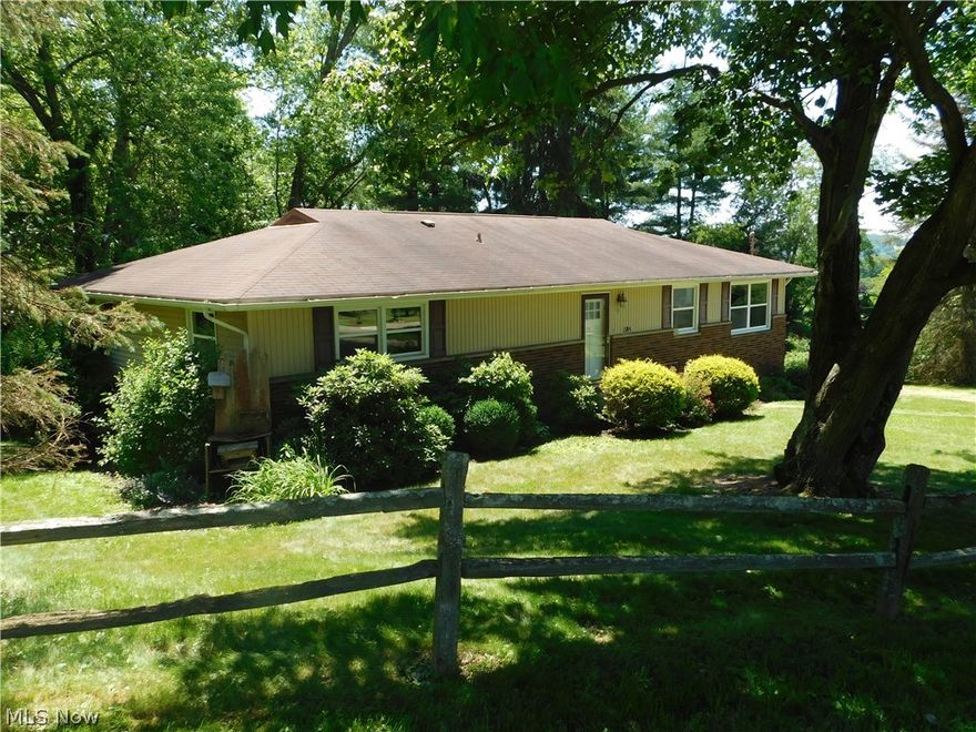 Looking for privacy and still be close to both the hospital and school? With woods behind it this home offers peace and solitude away from the hustle and bustle of everyday life. This brick and vinyl sided ranch home offers 4 bedrooms, 2 full baths, updated kitchen, dining and living room on the main floor with a family room, full bath and a 2 car garage in  walkout lower level.