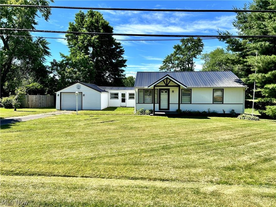 Welcome to this charming home on a quiet corner double lot! This inviting 3-bedroom, 1-bathroom home offers comfort and space, nestled on 0.42 acres in a serene neighborhood. Upon entering, you'll appreciate the cozy atmosphere and the seamless flow from room to room. The living area is perfect for relaxing or entertaining guests, featuring ample natural light and a warm ambiance. All three bedrooms are generously sized, offering privacy and comfort. Each room provides versatility, whether for family living, guest accommodation, or a home office. Outside, you'll find a partially fenced-in backyard, providing a tranquil space for outdoor activities and privacy. The oversized 1-car garage offers ample storage and workspace, with additional parking available. A highlight of this property is the shed with electric, ideal for hobbies or extra storage, adding convenience and functionality to your daily life. New updates include a new metal roof on both the home and shed, newer hot water tank, and some modern updates throughout. Located in a desirable neighborhood, this home offers the perfect blend of suburban tranquility and convenience. Don't miss out on the opportunity to make this delightful property your own oasis!