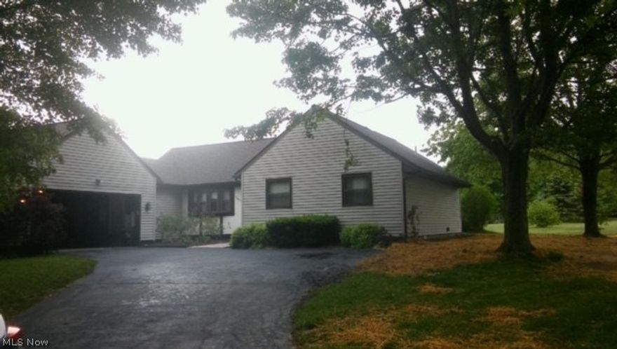 Clean 3 BR, 2 BA Ranch home with loads of improvements. Situated on 1 plus acres, This home is in MOVE IN pristine condition. Please see list attached dating everything from the roof, windows, appliances, furnaces etc...Entire home has been meticulously maintained. If your search includes a spacious yard in a quiet country area with a spacious eat-in-kitchen with gorgeous cabinetry, built in cook top and oven. Conveniences off first floor laundry, nice attached garage and full basement with workshop. Three bedrooms on first floor  and his and her closets and full bath in the master bedroom. Nice dining room and a huge living room with fireplace leading to a screened in patio and private deck. Then this is your home.