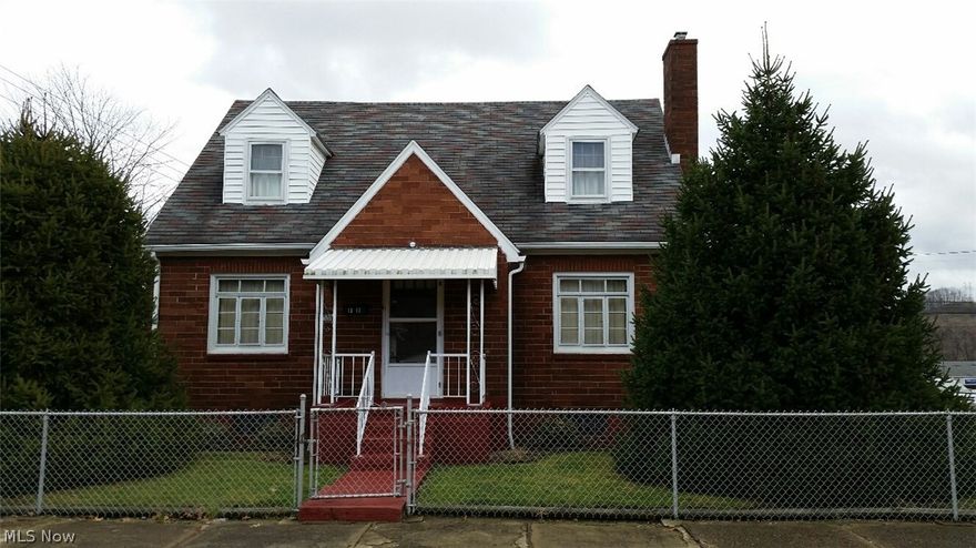 Well cared for brick home with updated gas furnace, gas hot water tank, new kitchen floor, breaker box and more.  The home has a bedroom on the main level, formal dining room and large living room. The full basement is painted and useable with a 3/4 bathroom. The sellers are leaving the stove, refrigerator, washer, dryer and freezer. The outside features include a covered rear porch, fenced yard, detached garage and carport. This home is neat and clean and within walking distance to the Toronto Jr/Sr school campus, park, shopping and more.