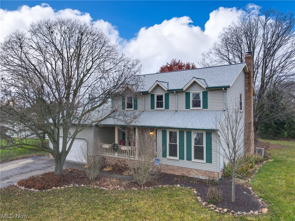 Welcome to 5085 Heather Ann Circle in Stow! This Colonial has wonderful curb appeal, cul-de-sac lot, and a very desirable floor plan. With 2052 sq ft the open floor plan has so much to offer; large eat in kitchen that opens to the family room with wood burning fireplace, French Doors that open into a playroom or office space, formal dining room, and first floor laundry! Upstairs you have 3 bedrooms with the primary bedroom and bath with a large closet. The basement space can be used as a 4th bedroom, recreation room, and gym! The front porch is a perfect spot to enjoy a morning coffee or an evening cocktail. The back deck is a great space for entertaining and grilling! The roof is roughly 2 years old, tankless water heater 2 years old, and furnace 9 years old! All you have to do is make this home your own!