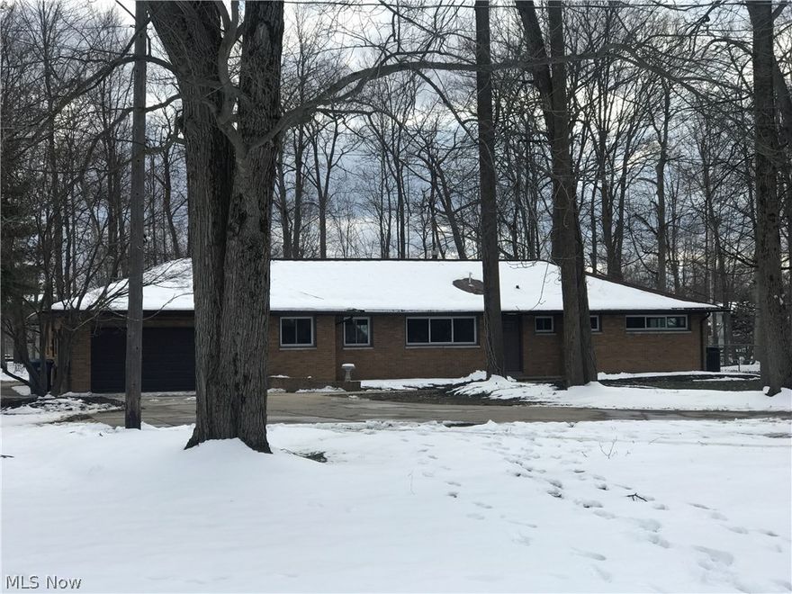Gorgeous turn key home newly updated, on just under ¾ of an acre of park like land.  This is a 3 Bedroom, 2 1/2 Bath Brick Ranch with 1768 square feet
Beautiful new flooring throughout first floor makes this home sleek & stylish! Chefs Will Love the updated kitchen with all new stainless steel appliances, tile backsplash and endless granite countertops. See a new twist on decorative concrete with an updated fireplace with mantle.  All new windows throughout home, including large windows in sun room overlooking the beautiful yard.  Sunroom has a new sliding glass door to the new stamped concrete patio.   Shed in backyard has steel door and electric. All bedrooms have new carpet.  Master bedroom includes updated bathroom and shower. Enjoy two other beautifully updated bathrooms as well. Newly carpeted finished basement with fireplace.  Extra deep, newly painted 2 car attached garage, with new garage door and opener.  Newer lighting inside and out.  All interior and exterior doors have b