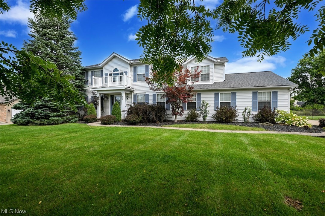Welcome home! This stately center hall Colonial is situated on a beautiful half-acre lot surrounded by gorgeous pines. This classic beauty has tons of space, 4 bedrooms, 2 full & 2 half baths, a finished lower level with a second kitchen, and major updates including a new roof, furnace, and central air conditioning. Step inside to a 2 story foyer with a formal dining area to the right and living rm (or office) to the left. The spacious kitchen is open to the eating area and family room with sliders to a huge deck overlooking the big backyard. The stone fireplace adds to the ambiance, making it an ideal spot for creating memories with family and friends. The rich oak staircase leads to an open second-floor landing with windows and natural light. The private master suite has a walk-in closet and custom walk-in shower which is perfect for the space! The finished lower level offers even more living space with an enormous rec room, a pretty white kitchen, a bar for entertaining, a 1/2 bath,