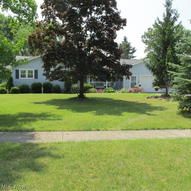 Move right in to this roomy 3 Bedroom, 2 Bath ranch! Updated Oak Kitchen with ceramic floor, new dishwasher, sink, microwave and double ovens. Adjoining Family Room with wood burning fireplace with new floor and freshly painted. Brand new carpet throughout. Two sliders out to a 44 foot deck with electric retractable awning. Kayak heated pool with new lifetime warranty for walls, liner, solar cover and pump. Surrounded by privacy fence. Great for large family or summer parties! Full Basement with finished Recreation Room and another room that can be used as an Office/Bedroom. 2 1/2 Car Garage and widened driveway. Well taken care of. This could be your dream house. Home Warranty included!