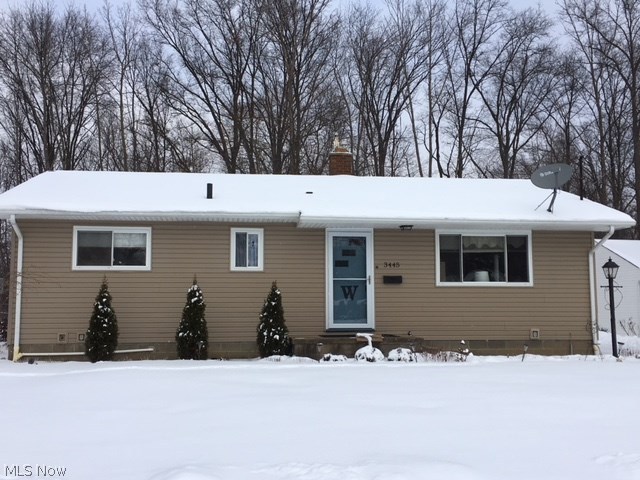 Amazing space in Mogadore! This 3 bedroom ranch offers all you need and more. With 2 full bathrooms, living room, eat-in kitchen, huge open living area, family room and 4th bedroom in the basement. When you walk in the front door you will love the beautiful original hardwood floors. The living room opens into the kitchen with all appliances included. Down the hall you will find 3 bedrooms, all with hardwood floors and the main floor bathroom. New Bath Fitter surround (with lifetime warranty), linen closet, newer vinyl flooring, updated lighting and new toilet. But that's not all.. The lower level has so much space with 5 extra rooms and a full bathroom! Bathroom has a new toilet, nice vanity and shower. There are glass block windows, 2 year old hot water tank, 7 year old furnace, sump pump and so much storage. New roof and siding 2007, updated windows, blown in insulation 5 years ago, new storm door and ceiling fans throughout. You can't forget the huge 24x30 2.5 car garage