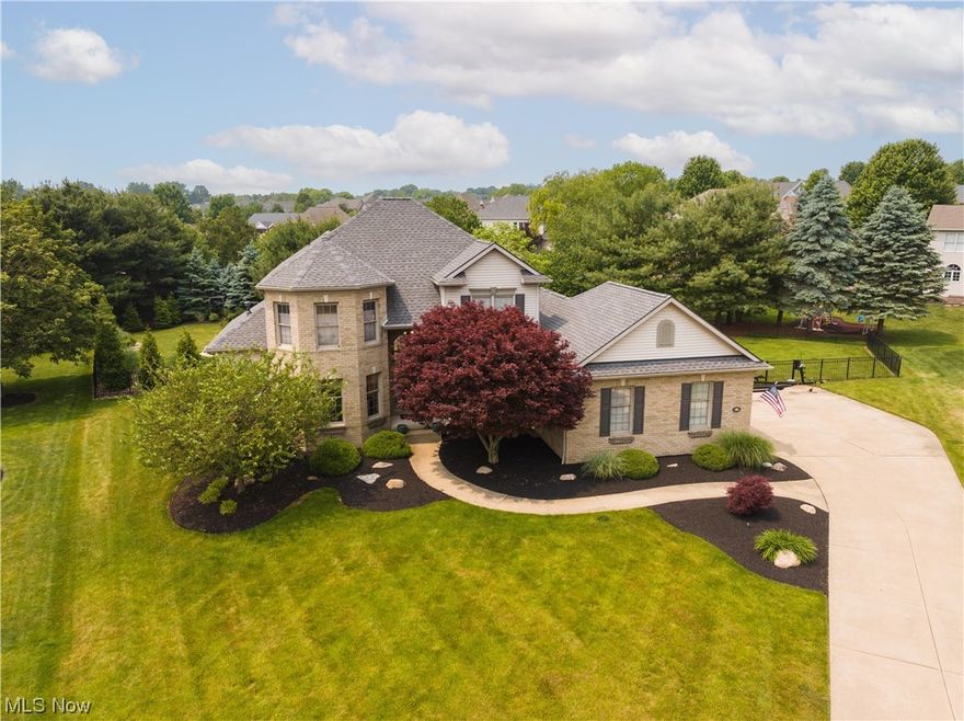 Welcome to MacKay Circle, tucked along a quiet cul-de-sac in Saint James stands nearly 4,000 square feet of impressive design and unexpected upgrades. Step into the the stately two story foyer and notice the custom ceramic inlay tile work, the catwalk overlook and first floor open concept layout. Sight lines carry through the vaulted great room to the gas /wood fireplace and out the large scale windows overlooking your meticulously maintained landscaping. In this space we also find a formal dining area, currently set as a cocktail lounge and a private first floor office flooded with natural light. Just off the great room sits a beautifully renovated kitchen. Complete with solid KraftMaid maple cabinetry, Crema Bordeaux granite surfaces, substantial sit up island w/ built in's and a fantastic breakfast room flanked on by windows on all walls. The home opens seamlessly into the outdoor living area, truly an oasis stepping down the custom stamped concrete levels on to the pool deck. This private yard with mature landscaping and wraparound irrigation system is fully fenced with four foot aluminum deco rail & post. The chemical free pool features custom rope fountains and multiple levels, comfortable for all swimmers! Moving into the owners suite, these owners have spared no expense here creating a massive walk-in tile & marble shower complete with Moen fixtures, automatic smart shower systems and a walk-in closet. Message the listing agent for a full list of extensive updates!