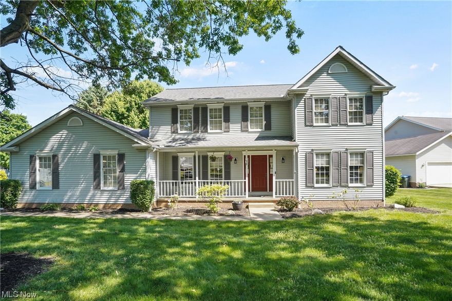 Fantastic home built by Michael Valle Builders in Woodridge Schools offers 4 bedrooms and 3 full baths.  The eat-in kitchen is huge and offers a pantry and sliders to large deck with LED lighting and nice backyard.  Family room features a gas fireplace and is open to the living room - perfect for entertaining.  Nice dining room, first floor laundry, and full bath complete the first floor.  The second floor features all four bedrooms (all are good size and have ample closet space).  The primary bath offers a jacuzzi soaking tub, walk in shower, and walk in closet.  Ecobee thermostat system will convey.  The basement could easily be finished and the oversized 2 car garage has an extra storage area and attic access for even more storage.  Updates include:  Carpeting in 3 bedrooms - 2022, Carpeting in primary bedroom - 2019.  Hot water tank & primary bath floor  - 2018, Furnace and AC - 2014, Roof replaced in 2011.  Home warranty provided by the seller.