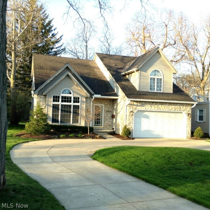 Beautiful Cape Cod with Lake Erie views in prime location! Huge vaulted 2-story foyer welcomes you into this highly updated open floor plan. Kitchen gutted and expanded in 2013 with high-end cabinets, finishes, and appliances. Great for entertaining with clear sight line from kitchen to the entry, dining and family rooms. Family room features vaulted ceilings, skylights and a stone fireplace with walnut mantle. 1st floor bedroom/office with back yard views includes a new (2014) custom patio door. 1/2 bath updated 2014. Living and dining room with hardwoods, laundry room with custom built-in coat rack/bench finish the first floor.  Second floor has a large master bedroom and updated (2014) master bath with skylight and whirlpool tub. Second full bath also gutted to the studs (2014) updated and attached to another huge bedroom. 3rd bedroom upstairs and a loft/landing area complete the second floor. Recently finished basement includes a storage room with New HVAC and H20 (2012) as well as