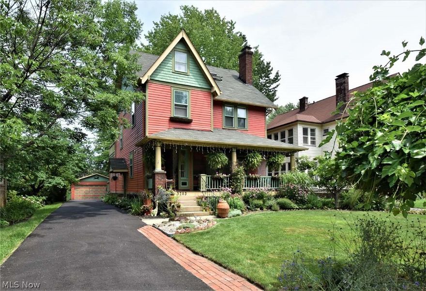An absolutely charming, unique to the Heights and beautifully updated Front Porch Colonial in the popular Cedar-Lee Neighborhood!  Fabulous remodeled Eat-in Kitchen with Amish made Rustic Alder Cabinets, Granite Countertops, Tuscan Slate Floor & Stainless Steel Appliances!  The refinished Hardwood floors are gleaming on the 1st and second floors.  The full bath on 2nd Floor has been updated and the 1/2 bath in the basement boasts a new tile floor.  Vinyl Windows throughout (except for the Living Room to keep the esthetic of 1921!).  The landscaping is lovely and there are several outside areas to enjoy... from the front porch, rear deck, private patio & fire pit, to the 2nd level open porch with a view of the spectacular rear yard!  The custom built cedar Chicken Coops are run with a battery powered light sensing automatic door.  (If the new owners would like, the 5 chickens can stay!).  The garage has a large workshop/man cave with a wood burning stove for heating in the colder months